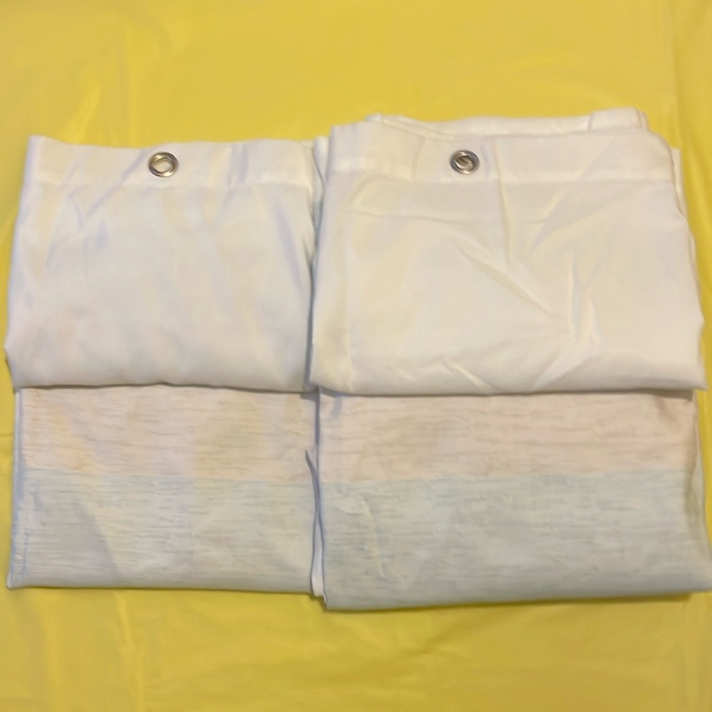 Set of 2 matching standard shower curtains.